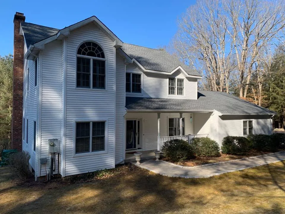 Vinyl siding installation on a home in Southbury, CT by Martin's Aluminum